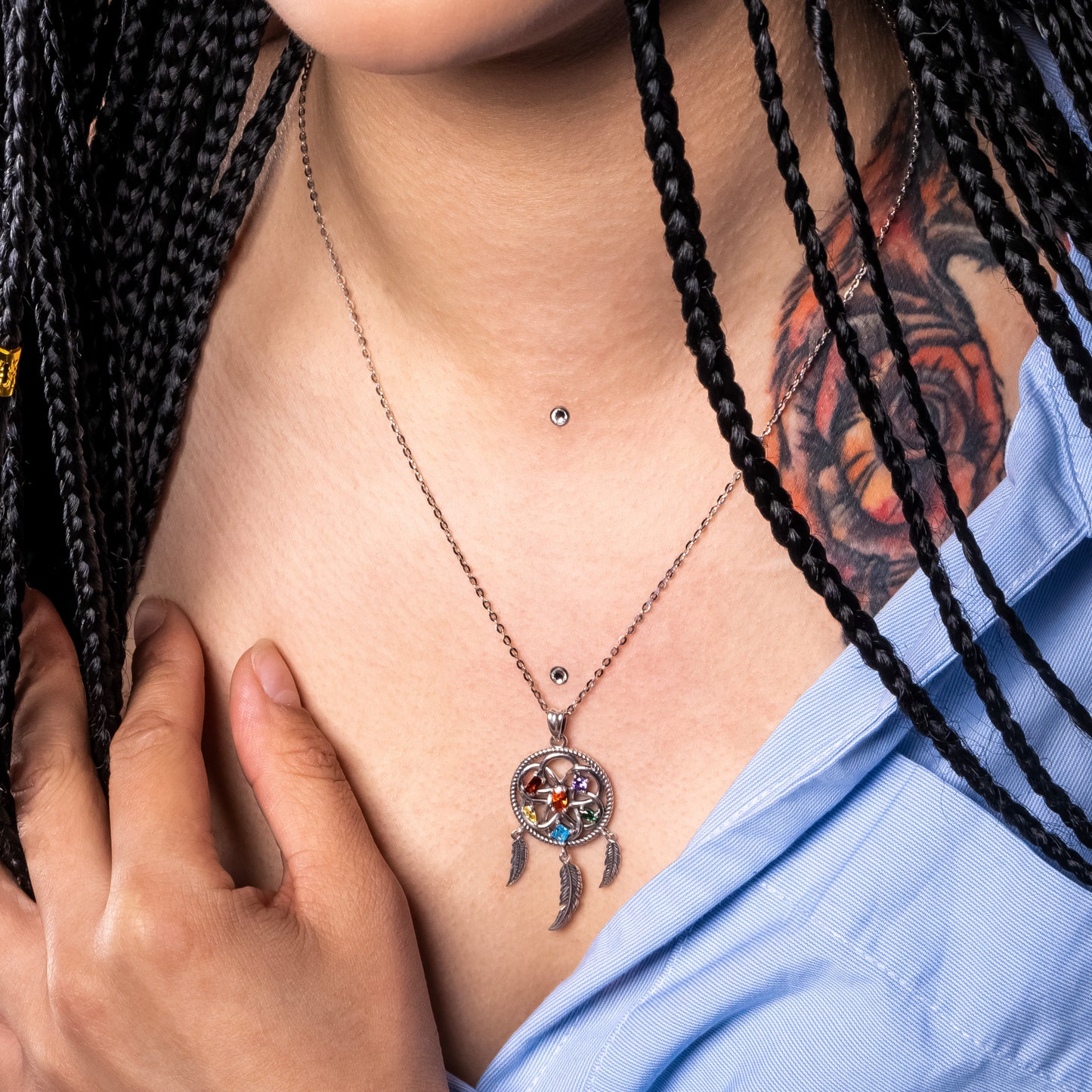 Model wearing Dreamcatcher Lucky Feather Pendant paired with Flat Cable necklace.