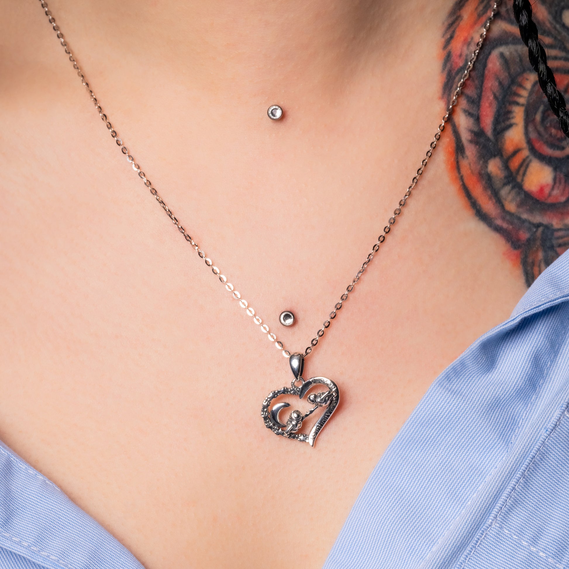 Moon Love Heart Pendant paired with Flat Cable necklace on the model. Zoomed view