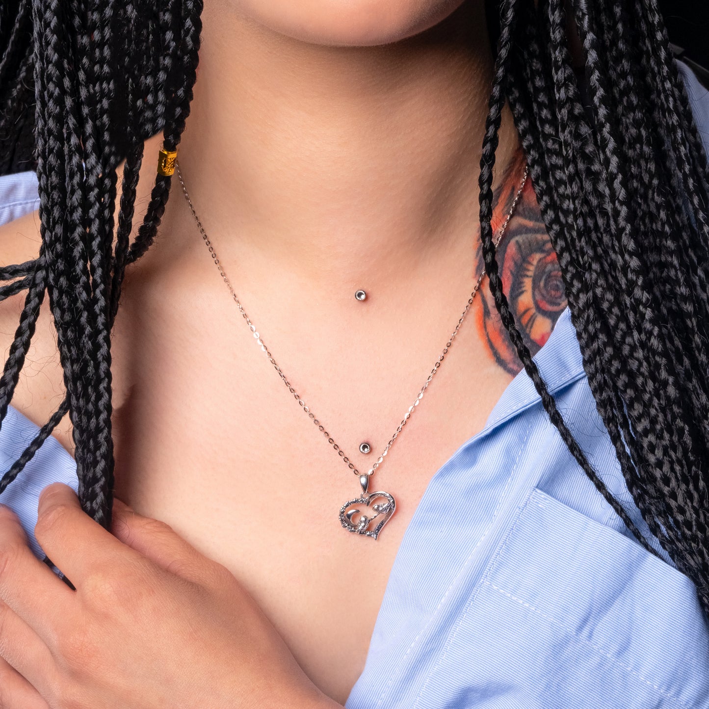 Moon Love Heart Pendant paired with Flat Cable necklace on the model.