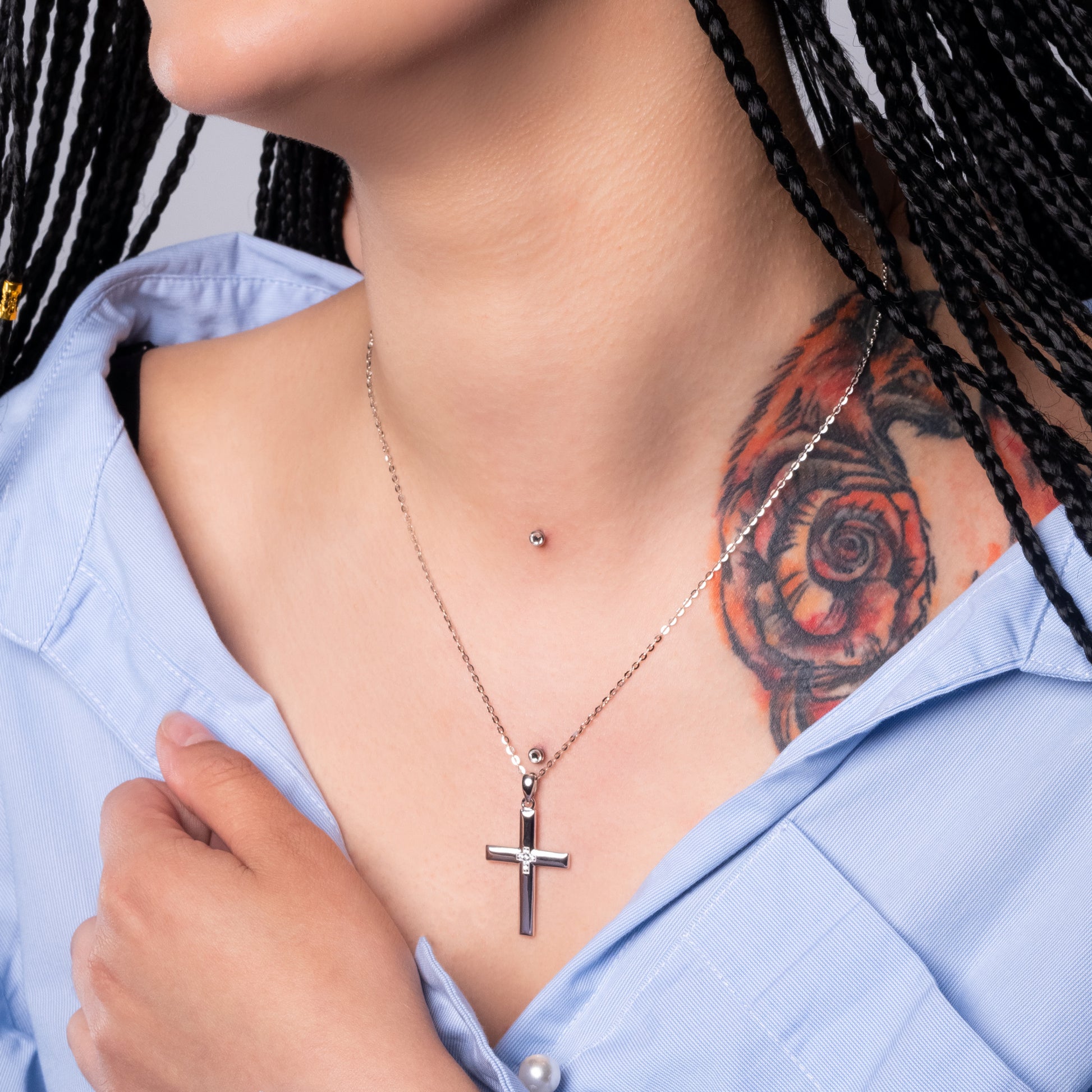 Model wearing Christian Cross Silver Pendant with Flat Cable necklace.