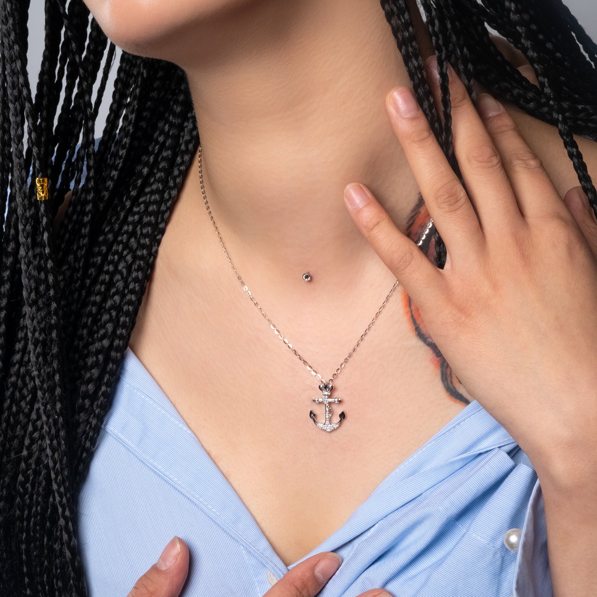 Model wearing Iced Anchor Silver Pendant paired with Flat Cable necklace