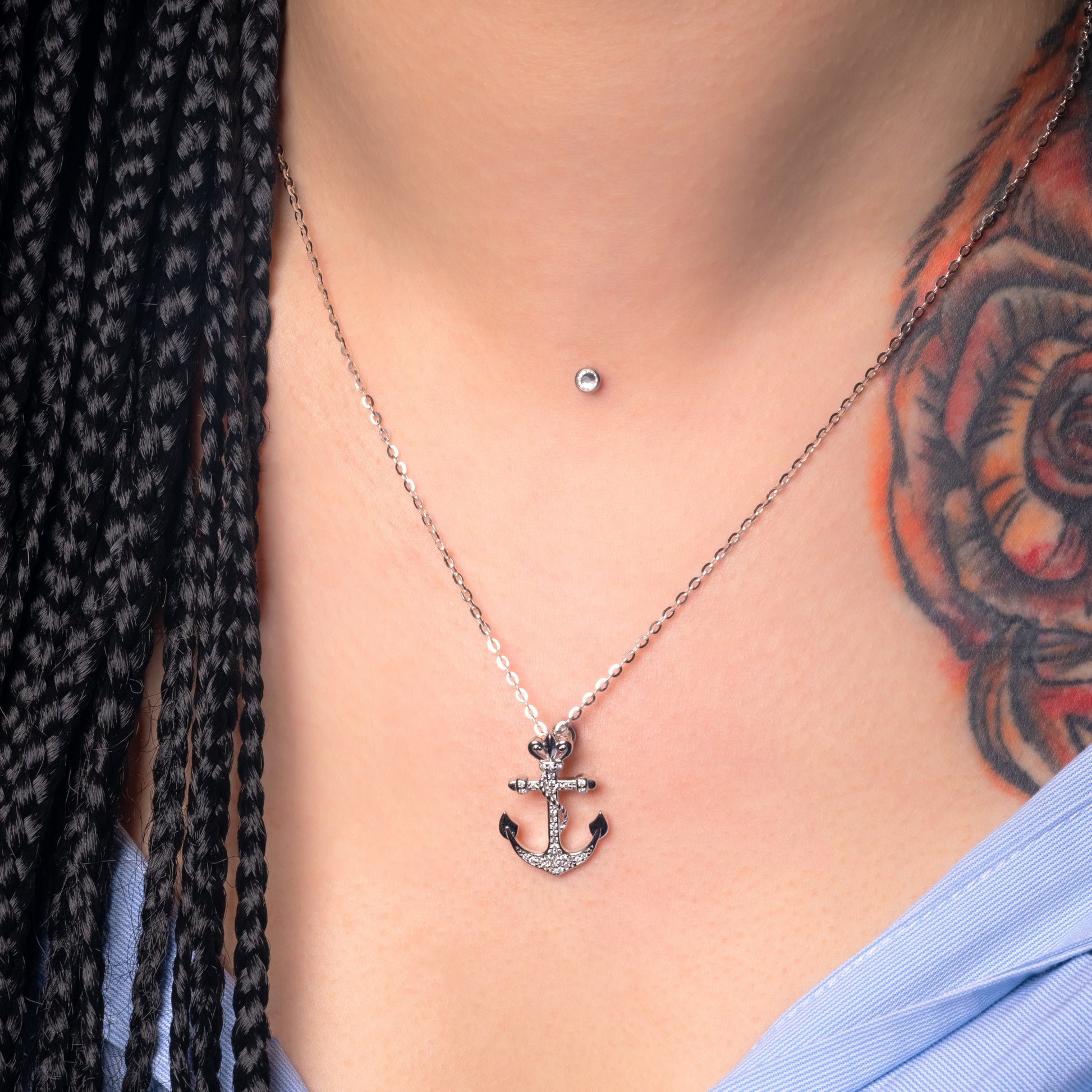 Model wearing Iced Anchor Silver Pendant paired with Flat Cable necklace Zoomed-in view.