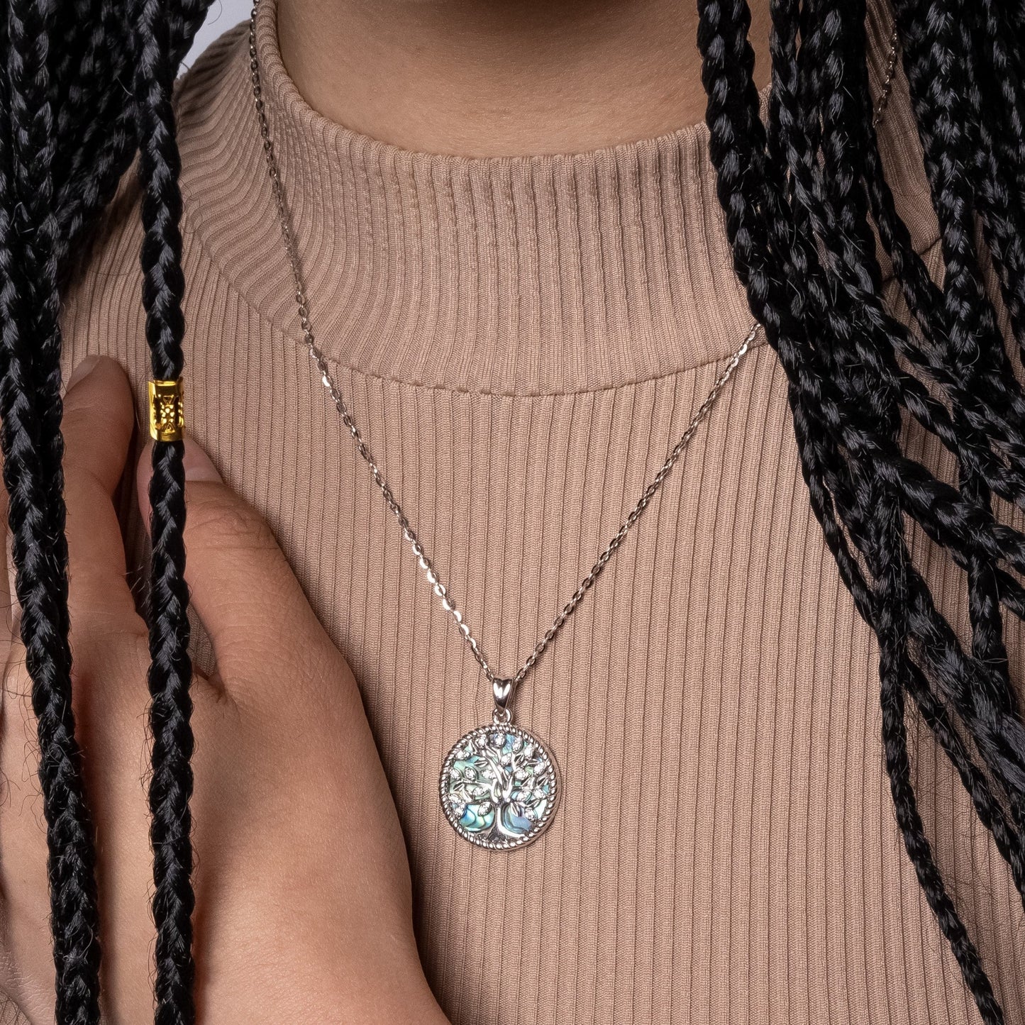 Model wearing Tree of Life Abalone Shell Pendant