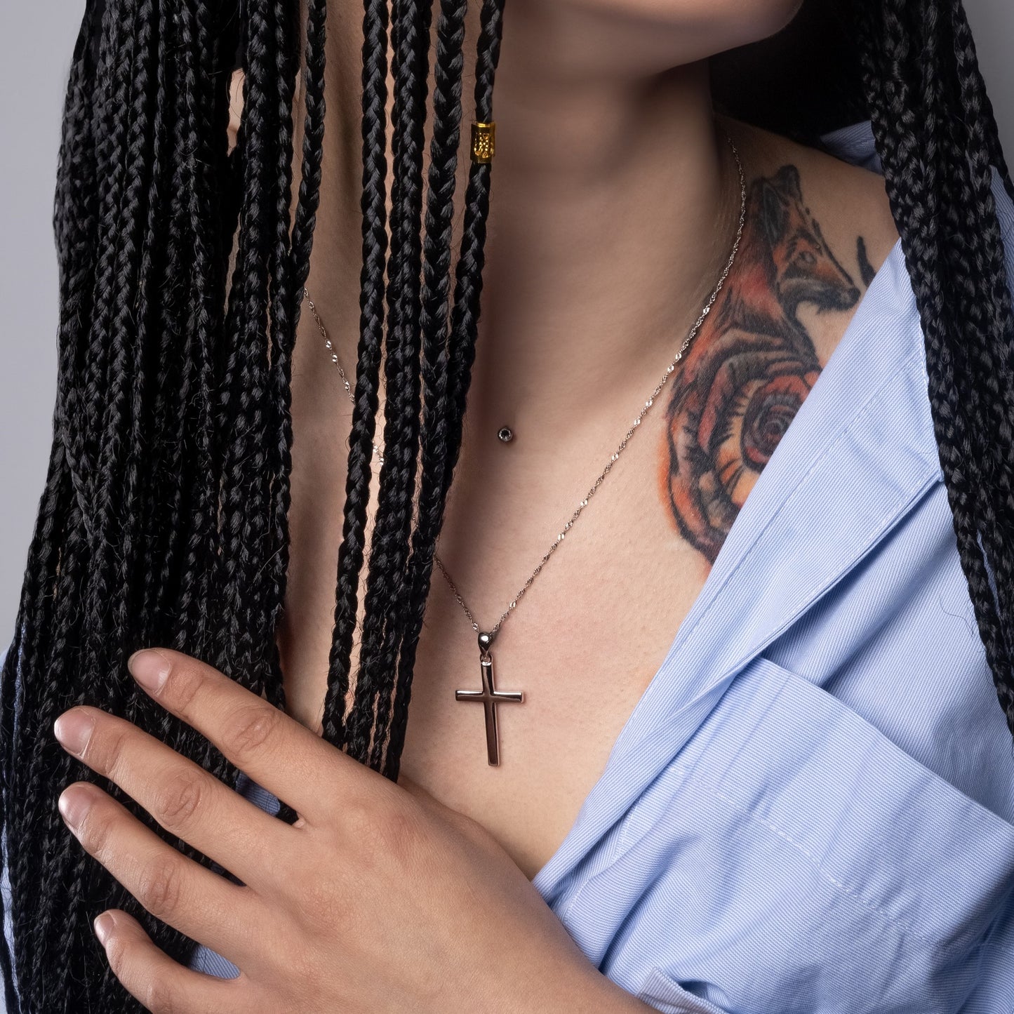 Model wearing Classic Cross Silver Pendant