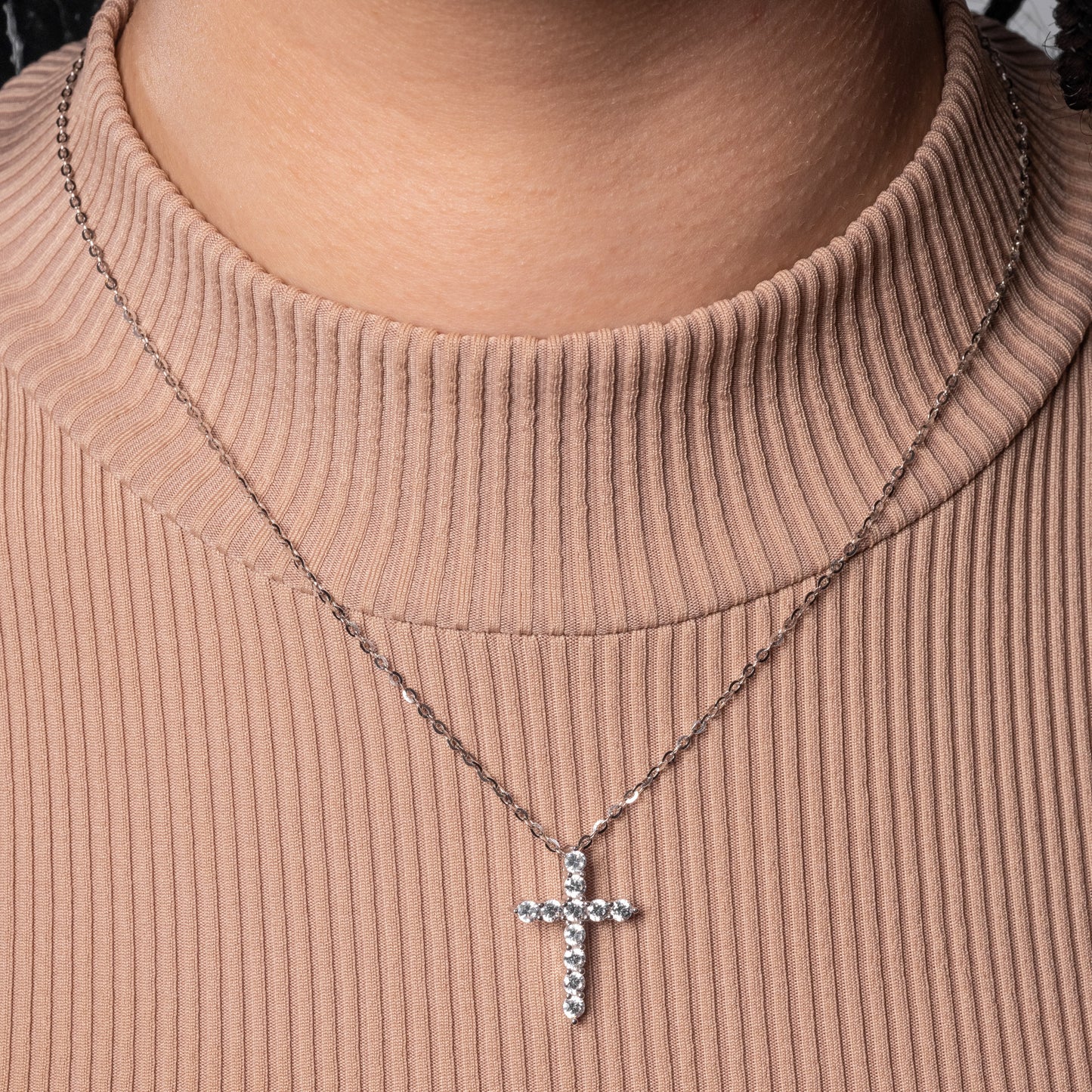 Iced Cross Pendant paired with Flat Cable necklace on the model