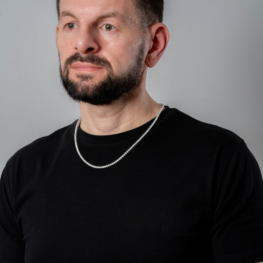 Bearded male model in a black t-shirt wearing Cubic Zirconia 3mm Silver Tennis Necklace