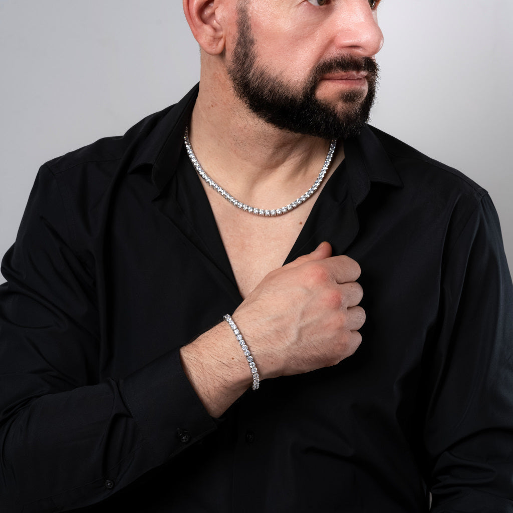 Male model in black shirt wearing Cubic Zirconia 5mm Silver Tennis Necklace and Bracelet set