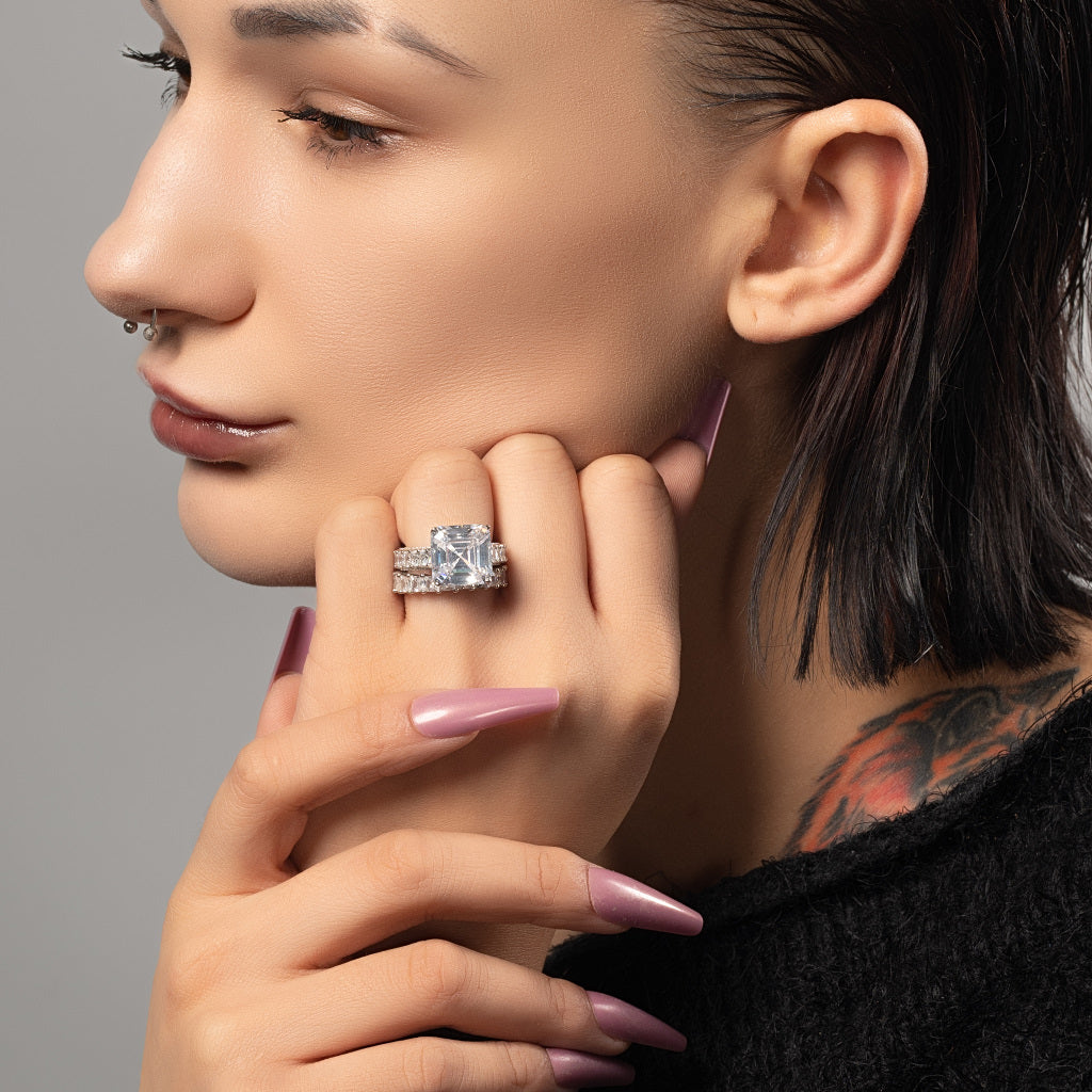 Female model wearing 5A Cubic Zirconia 925 Sterling Silver Stackable Engagement Wedding Ring Band on her middle finger