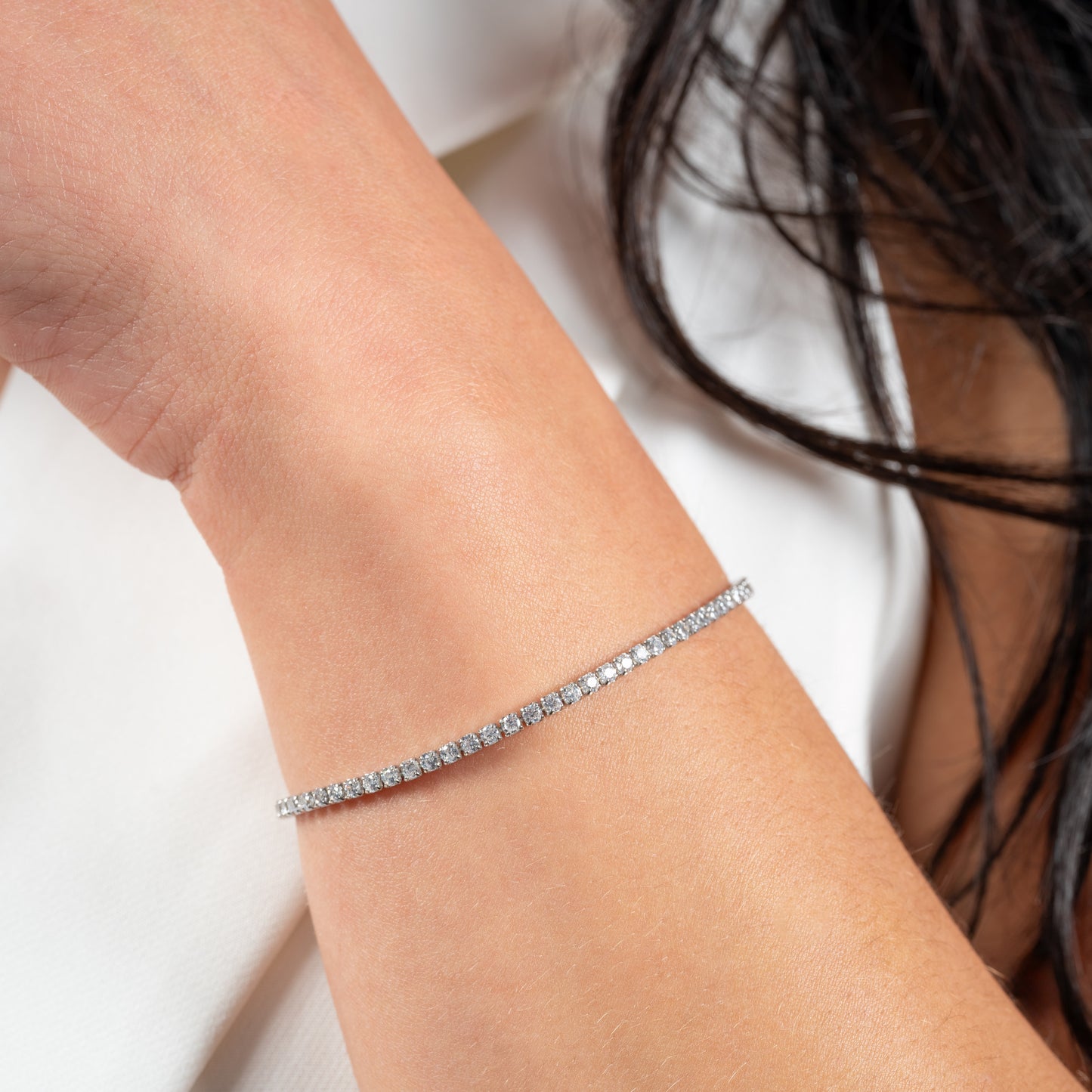 A model wearing Tennis CZ Silver Bracelet on her hand. Zoomed view.