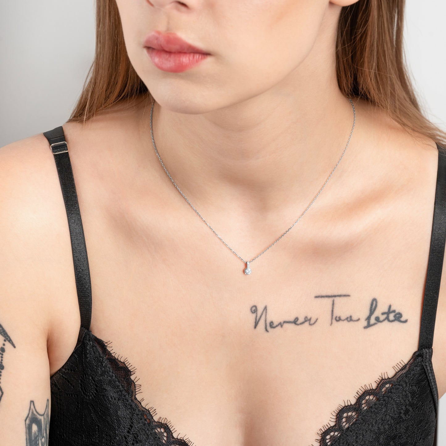 Tattooed model wearing Aureola Cubic Zirconia Silver Necklace