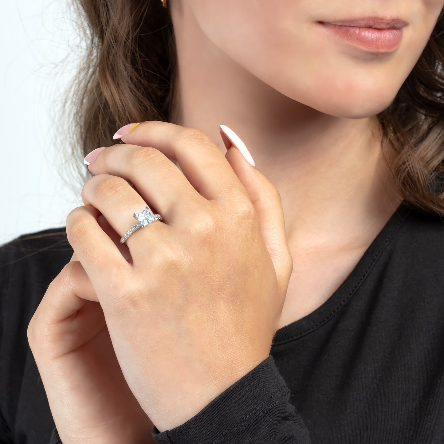 Model wearing Princess Secret Silver Ring on the finger.