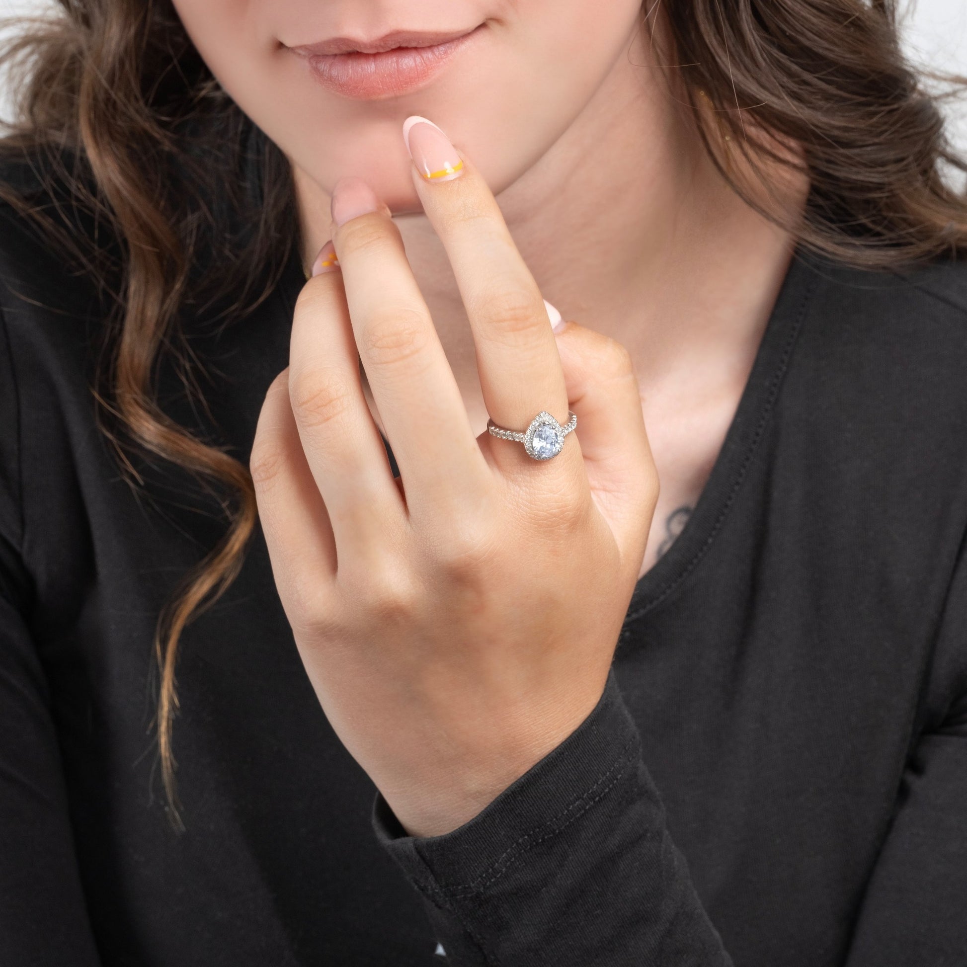 Model wearing Diamond Candy Silver Ring on her finger.