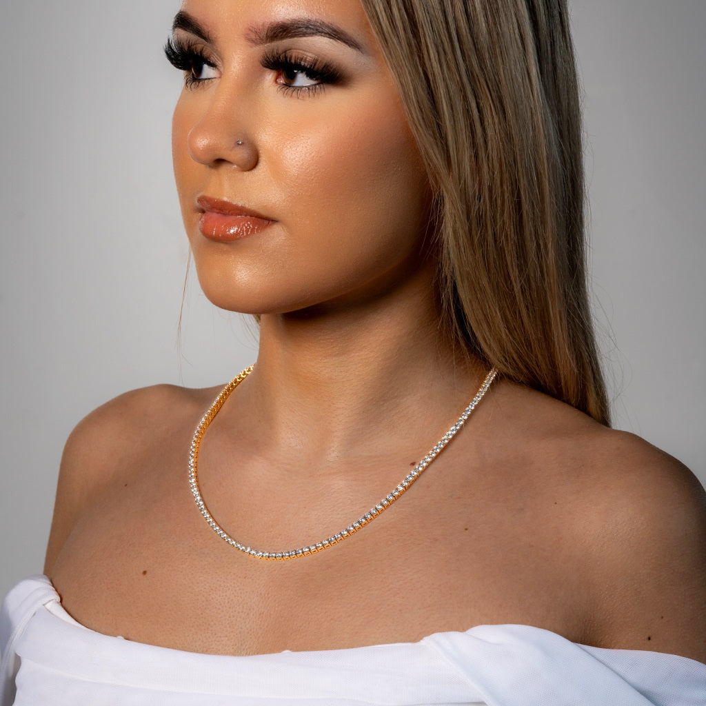 Female model wearing Cubic Zirconia 3mm Gold Tennis Necklace