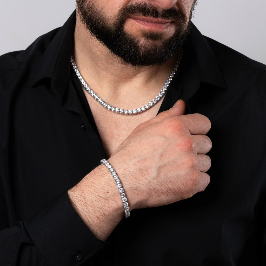 Bearded male model in black shirt wearing Cubic Zirconia 5mm Silver Tennis Necklace paired with matching 5mm Silver Tennis bracelet set