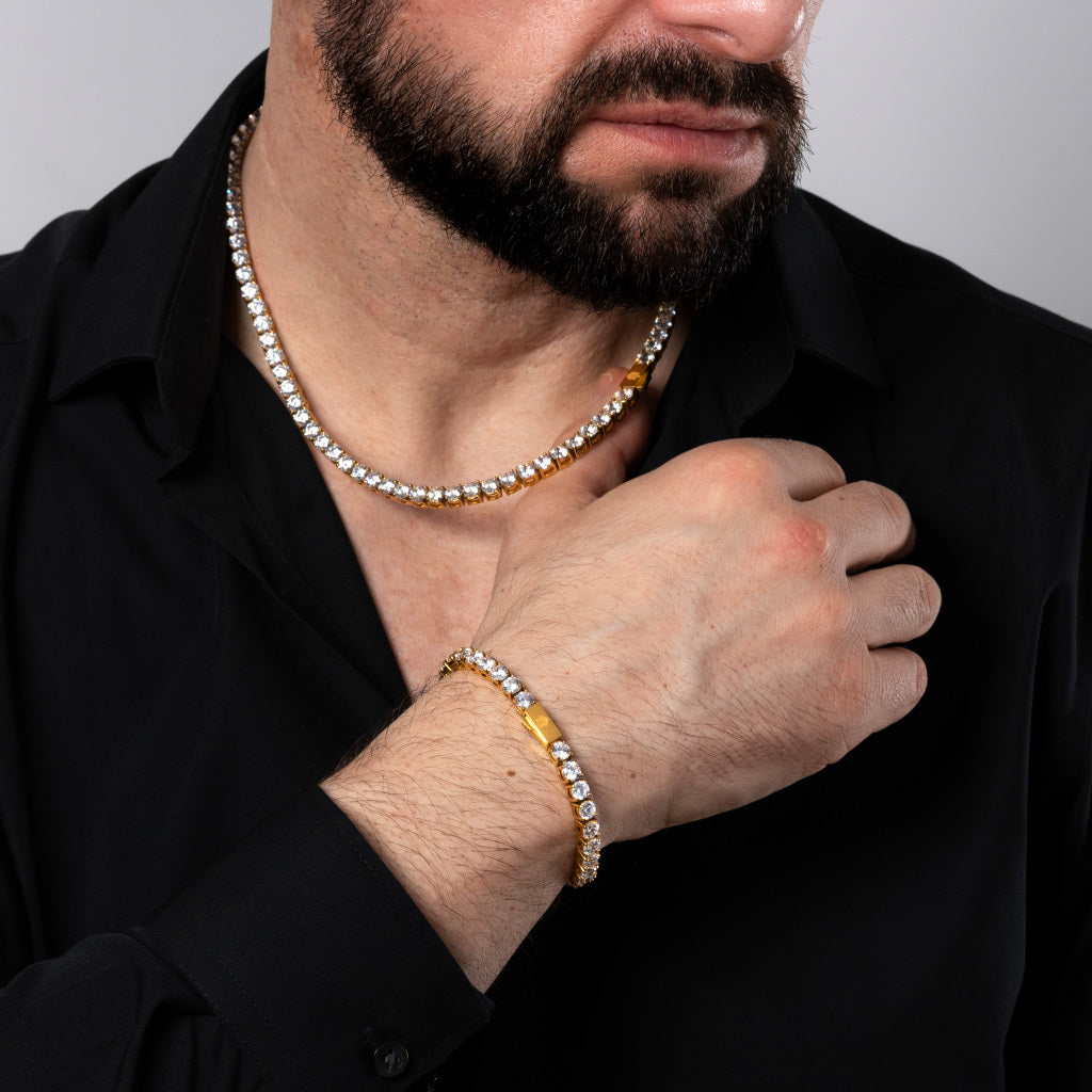 Man in black shirt wearing Cubic Zirconia 5mm Gold Tennis Bracelet paired with 5mm Gold Tennis Necklace