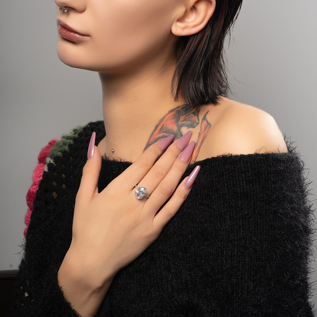 A female stunning model wearing Oval Cut Cubic Zirconia 925 silver ring.