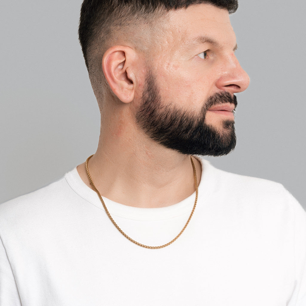 A male model in white t-shirt wearing Gold Spiga Chain 3mm, waterproof tarnish-free men's jewellery