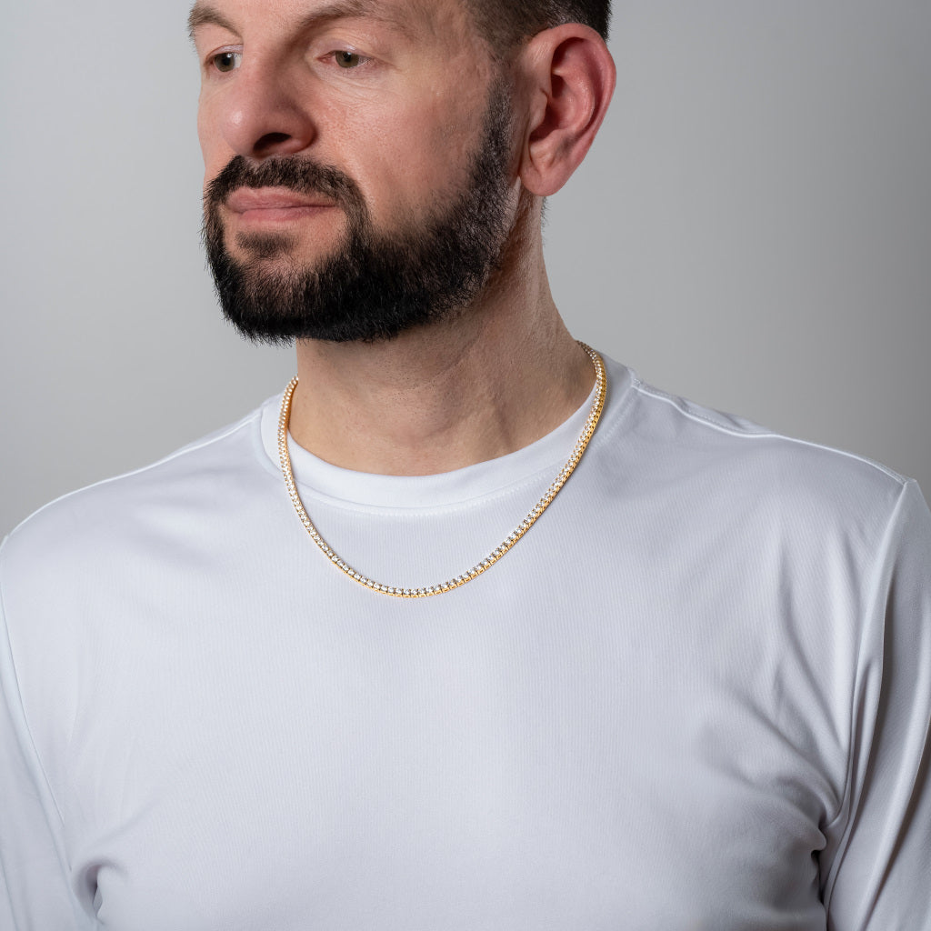 Bearded male model in a white t-shirt wearing Cubic Zirconia 3mm Gold Tennis Necklace
