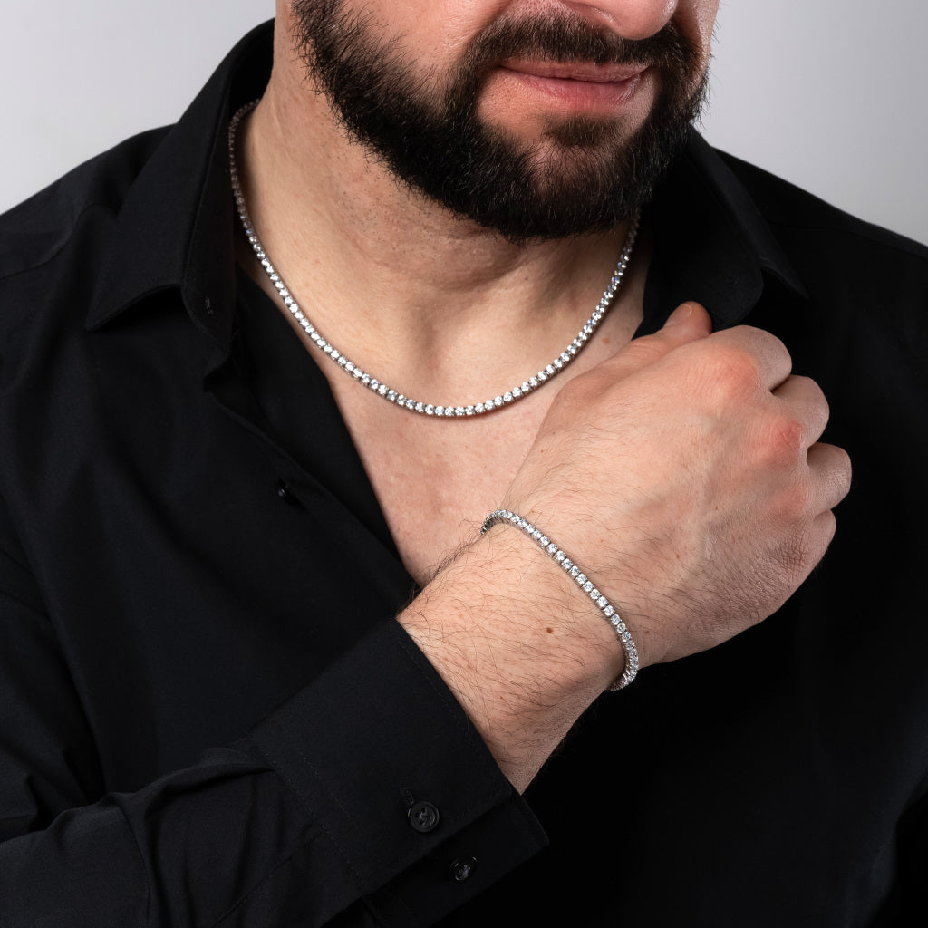 Man in black shirt wearing Cubic Zirconia 3mm Silver Tennis Bracelet paired with 3mm Silver Tennis Necklace