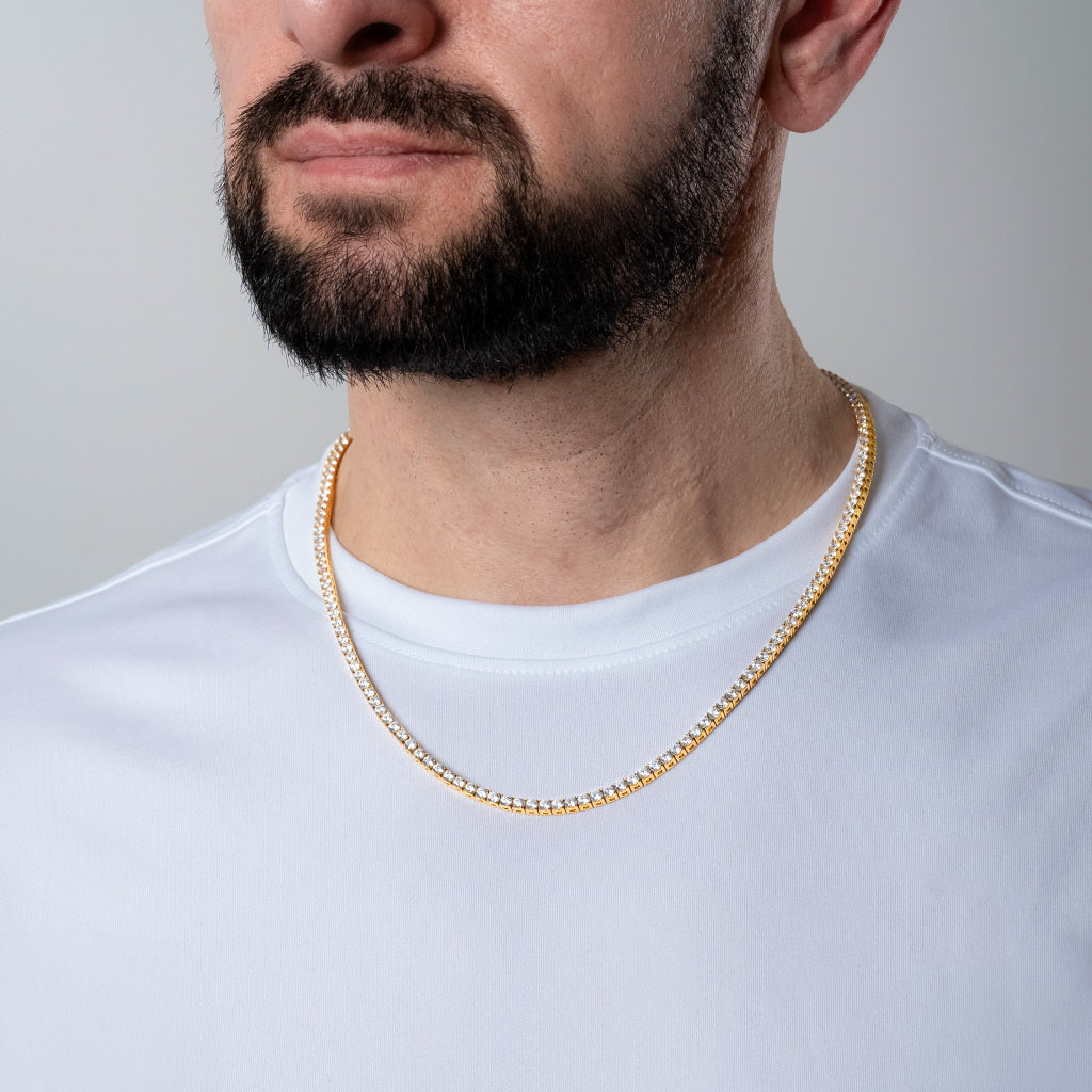 Man in a white t-shirt wearing Cubic Zirconia 3mm Gold Tennis Necklace