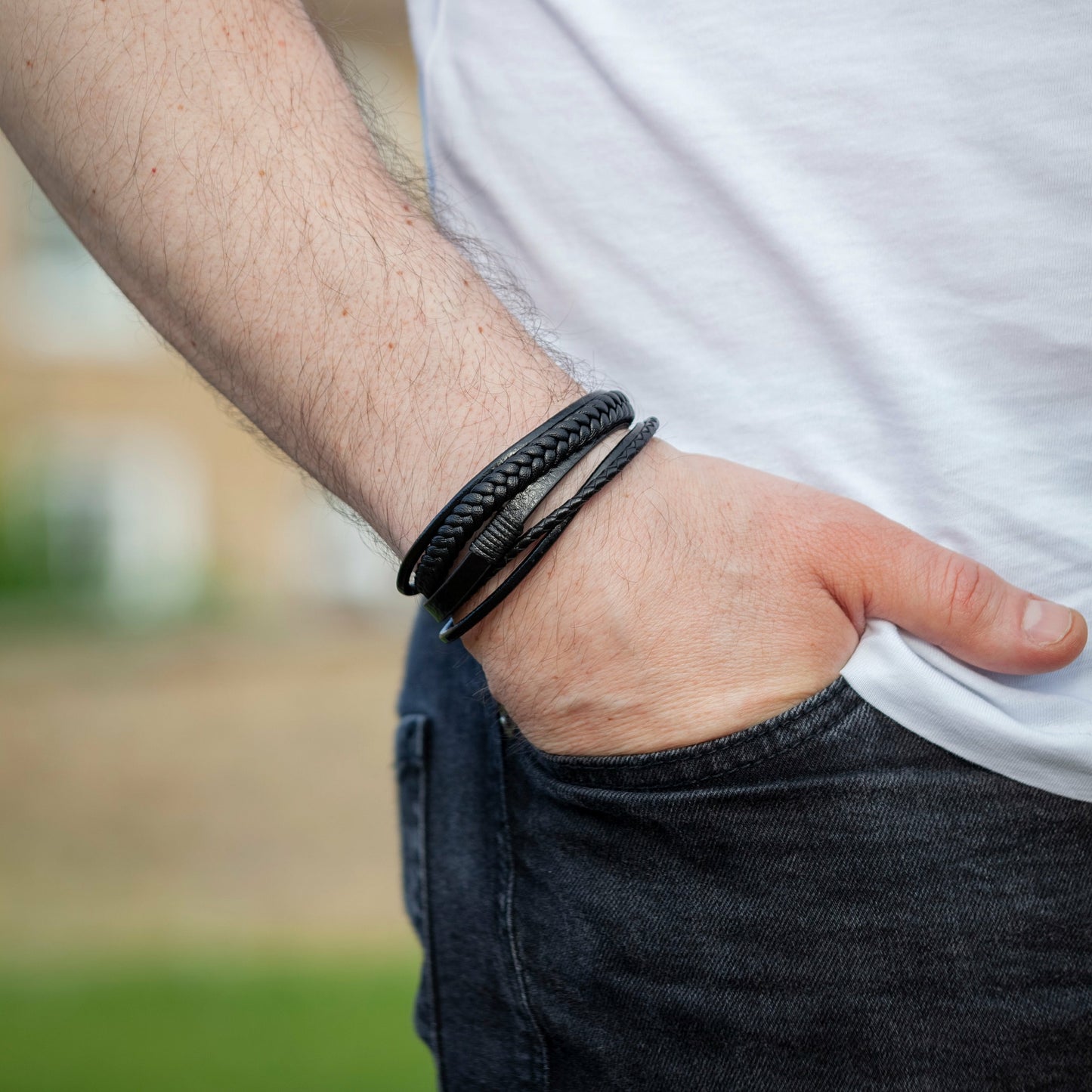 Crysttal Classic Leather Strap Bracelet in black on mans hand view