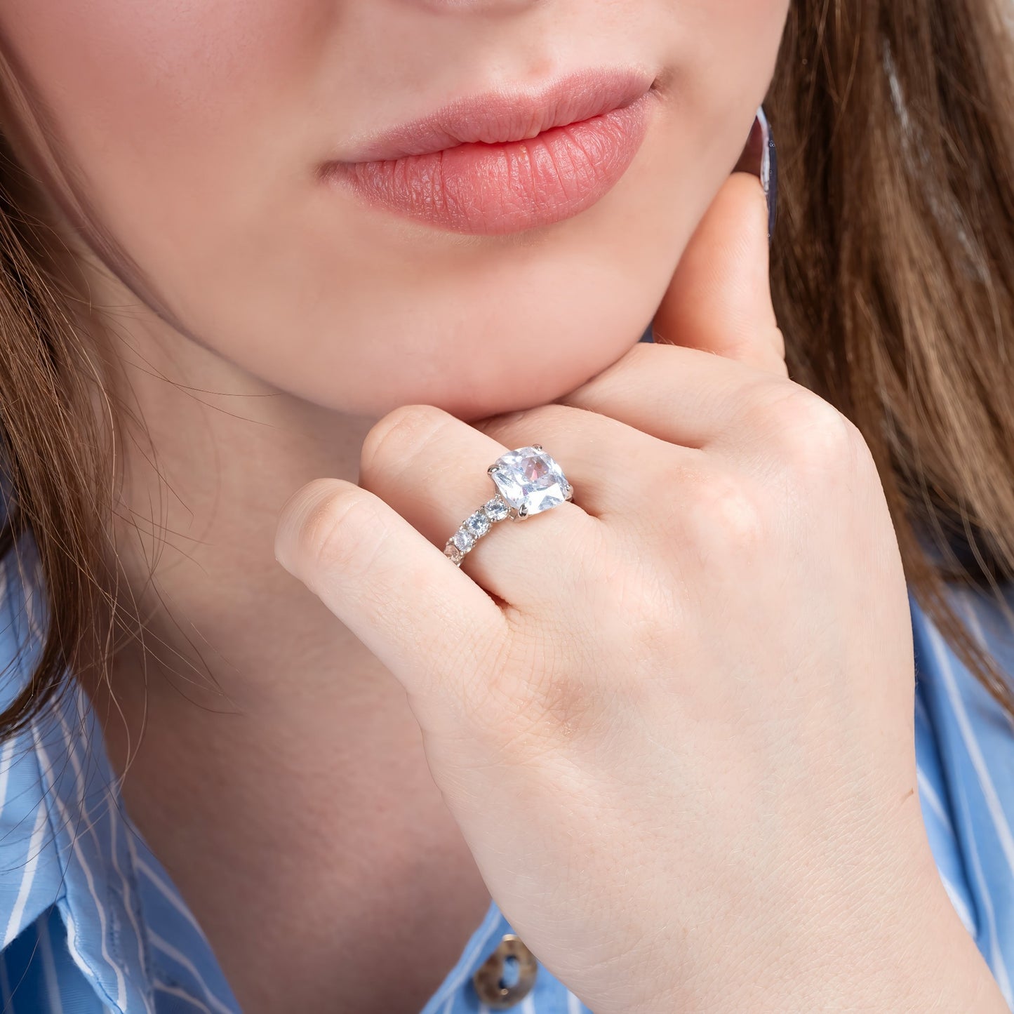 Model wearing Honey Lux Cushion Cut Engagement Ring on the finger.
