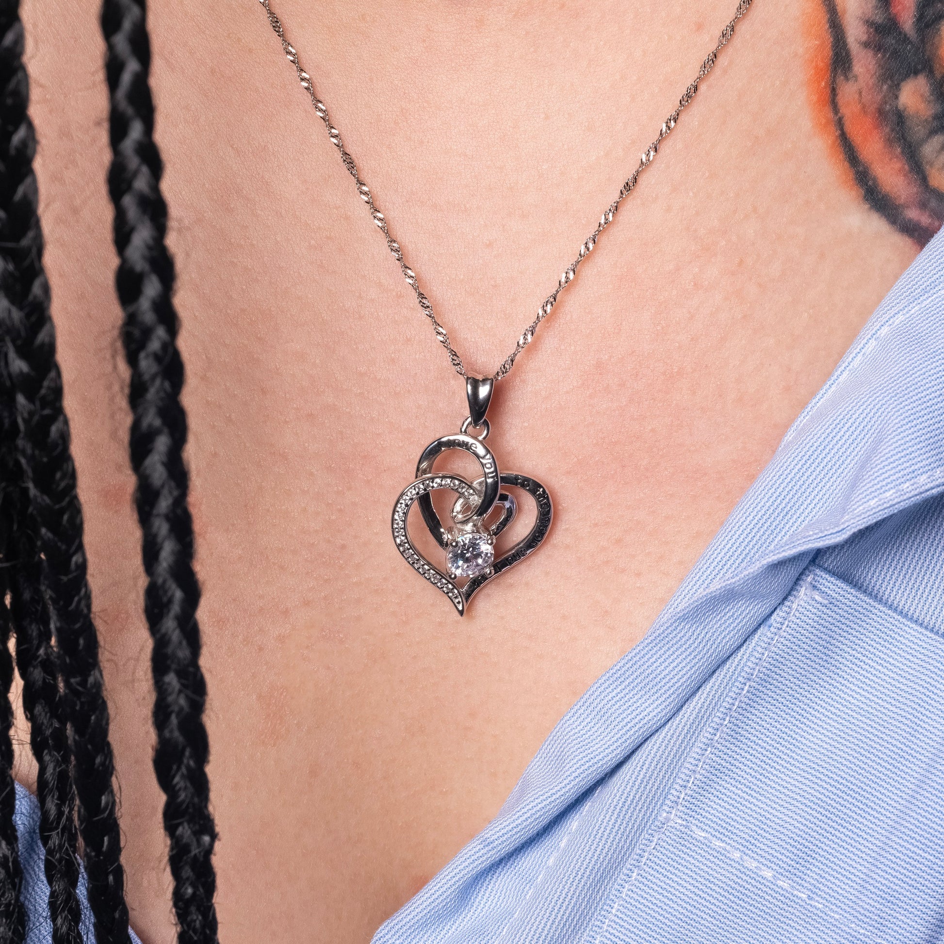 Tatooed Model wearing Twin Love Heart Engraved Pendant paired with Water Wave necklace. Zoomed View