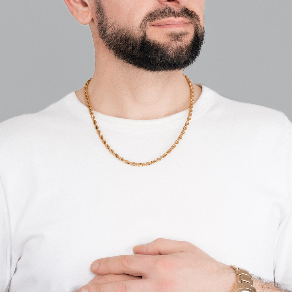 A bearded male model in white t-shirt wearing Gold Rope Chain 5 mm, 22 inches, statement, lifetime, stainless steel men's jewellery