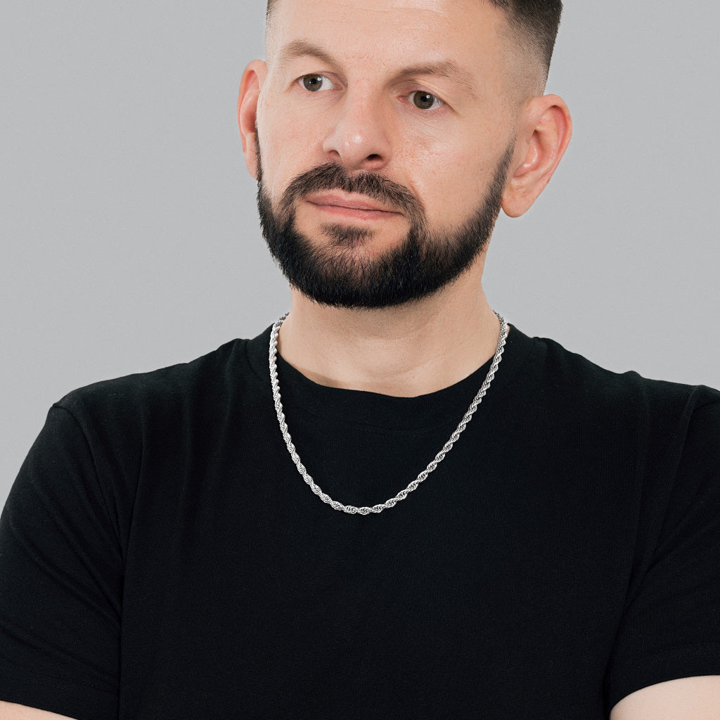 A bearded male model in black t-shirt wearing Silver Rope Chain 5 mm, 22 inches, statement, lifetime, stainless steel, hypoallergenic men's jewellery